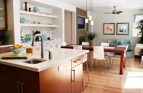 Clean sunny kitchen, sitting and dining room