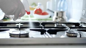 Using Windex on stove top to clean it