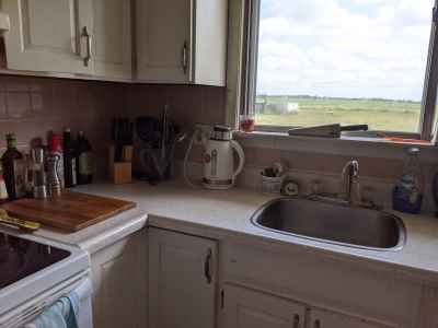 Clean kitchen counter with no dirty dishes