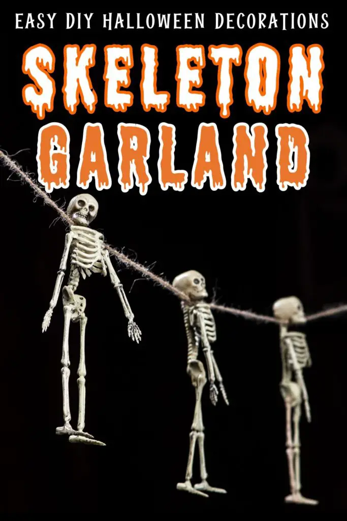 Pin text reads easy DIY Halloween decorations - skeleton gardland. Background image is plastic skeletons hanging from a string on a black background