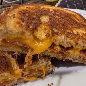 Grilled bacon and cheese on sourdough bread